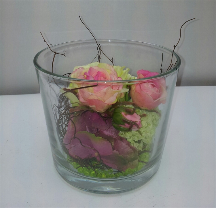 Zijden bloemen in glasvaasje