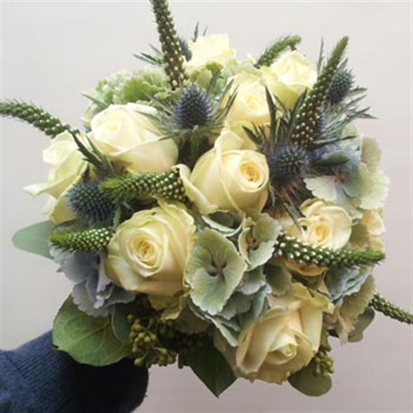 Bruidsboeket creme zeegroen blauw